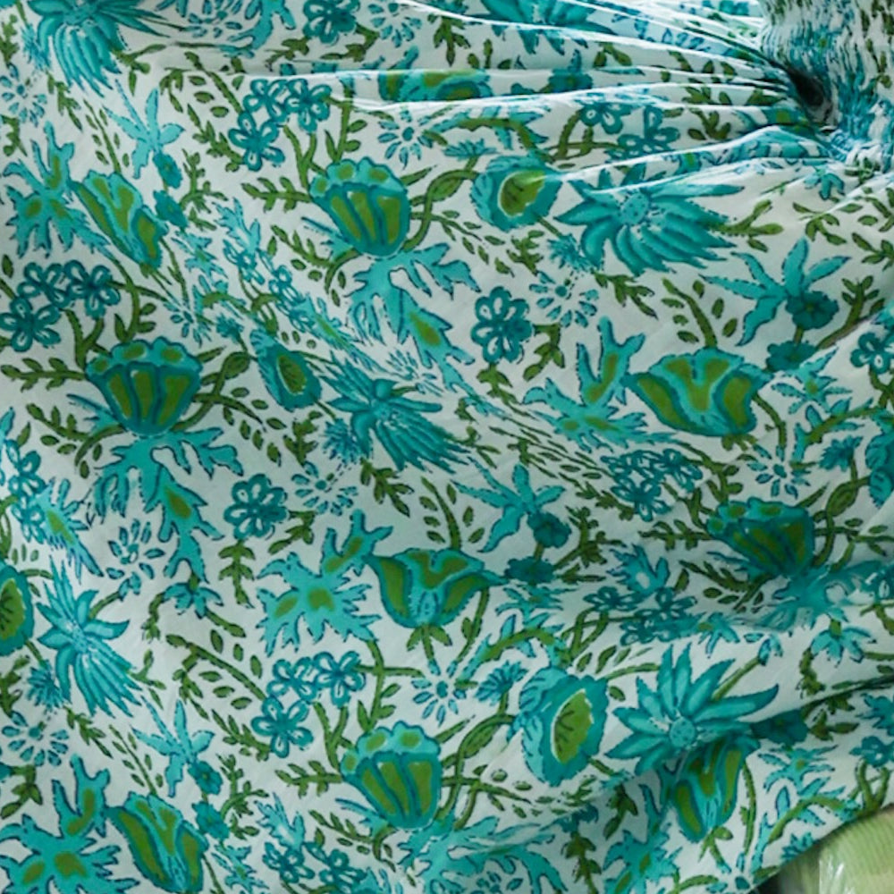 Meadow print fabric in teal and green